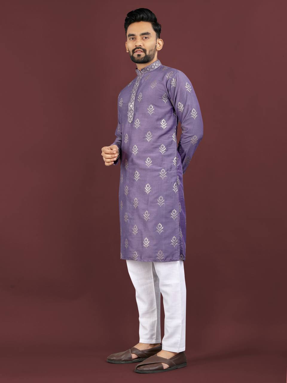 Man wearing Pehrang lavender jacquard kurta set with white pants and traditional shoes