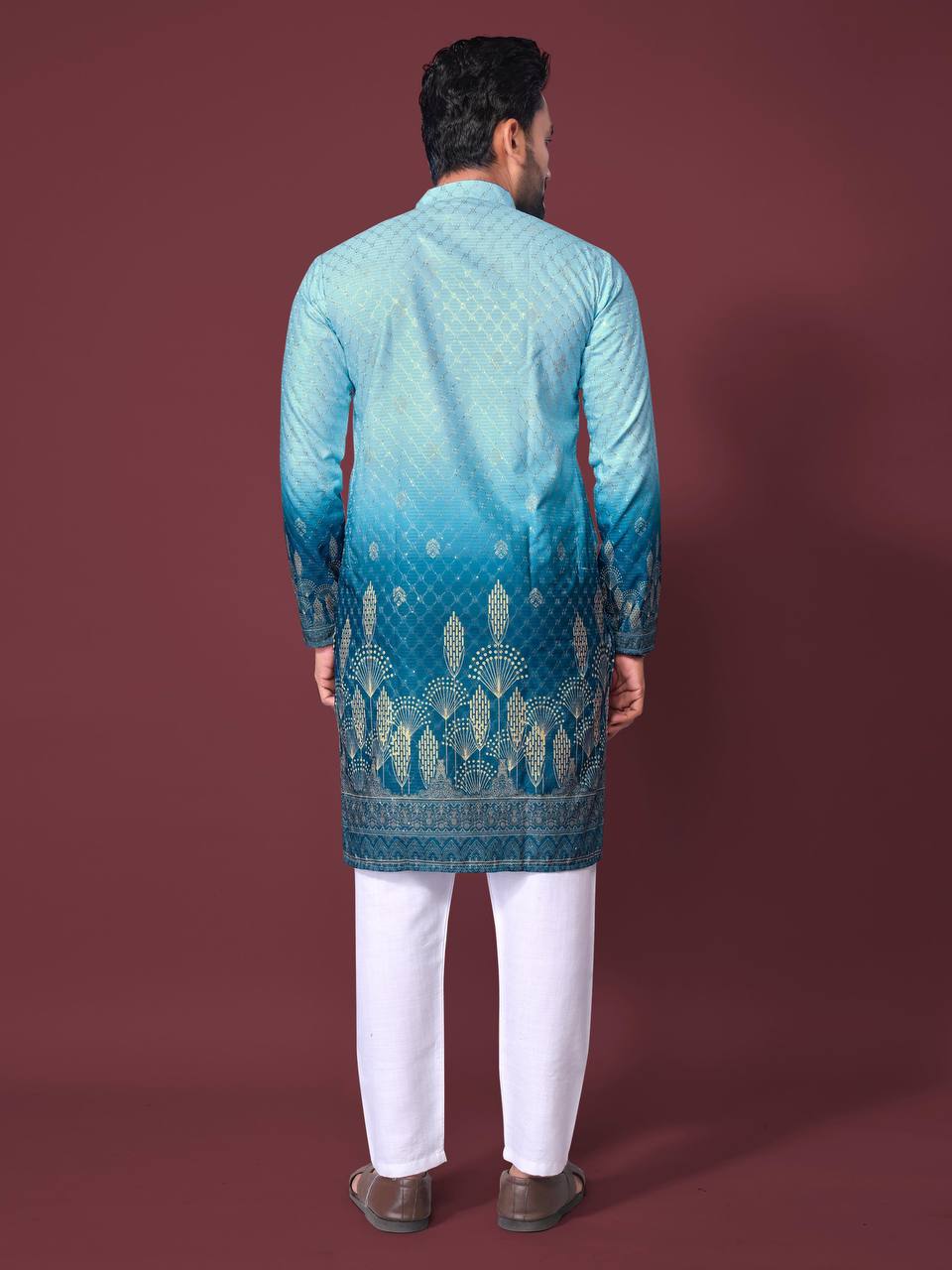 Back view of men's ombre kurta in shades of blue with intricate gold patterns by Pehrang