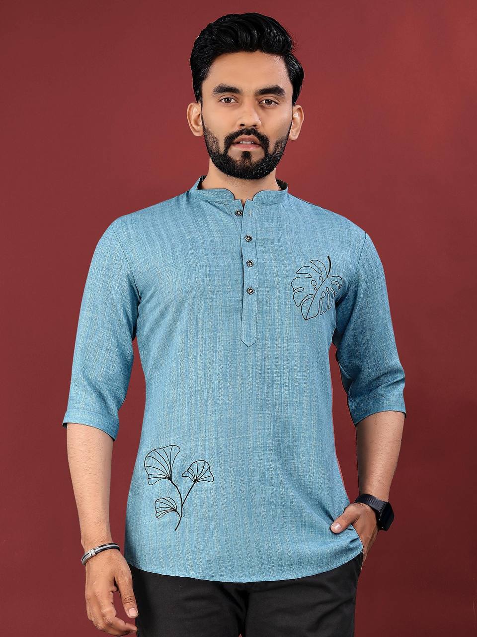 Pehrang ocean leaf embroidered kurta in light blue with black embroidery on chest and hip